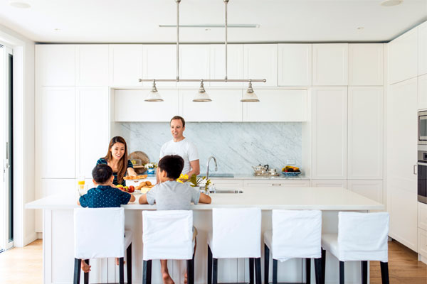 Photo of a happy family protected by liability insurance